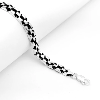 Ezüst szelvényes férfi karkötő